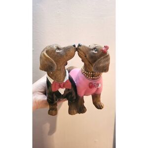 Dogs kissing couple new